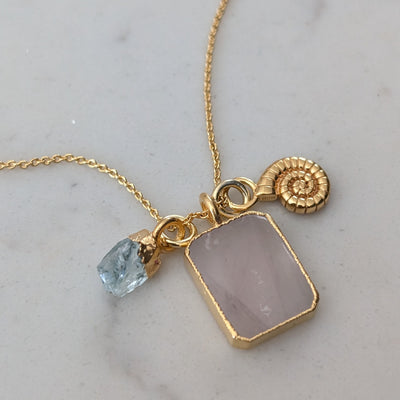 gold rose quartz, aquamarine and charm pendant necklace