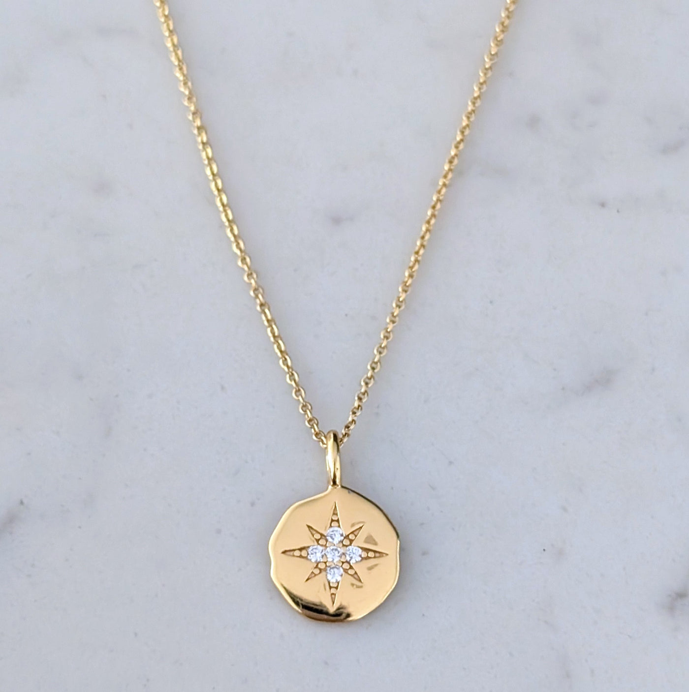 gold celestial starburst pendant necklace