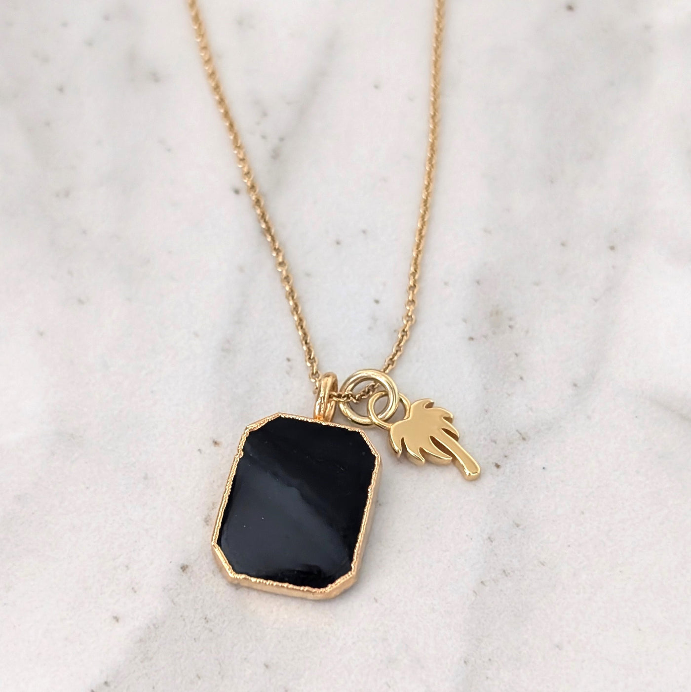 gold black tourmaline and gold charm pendant necklace