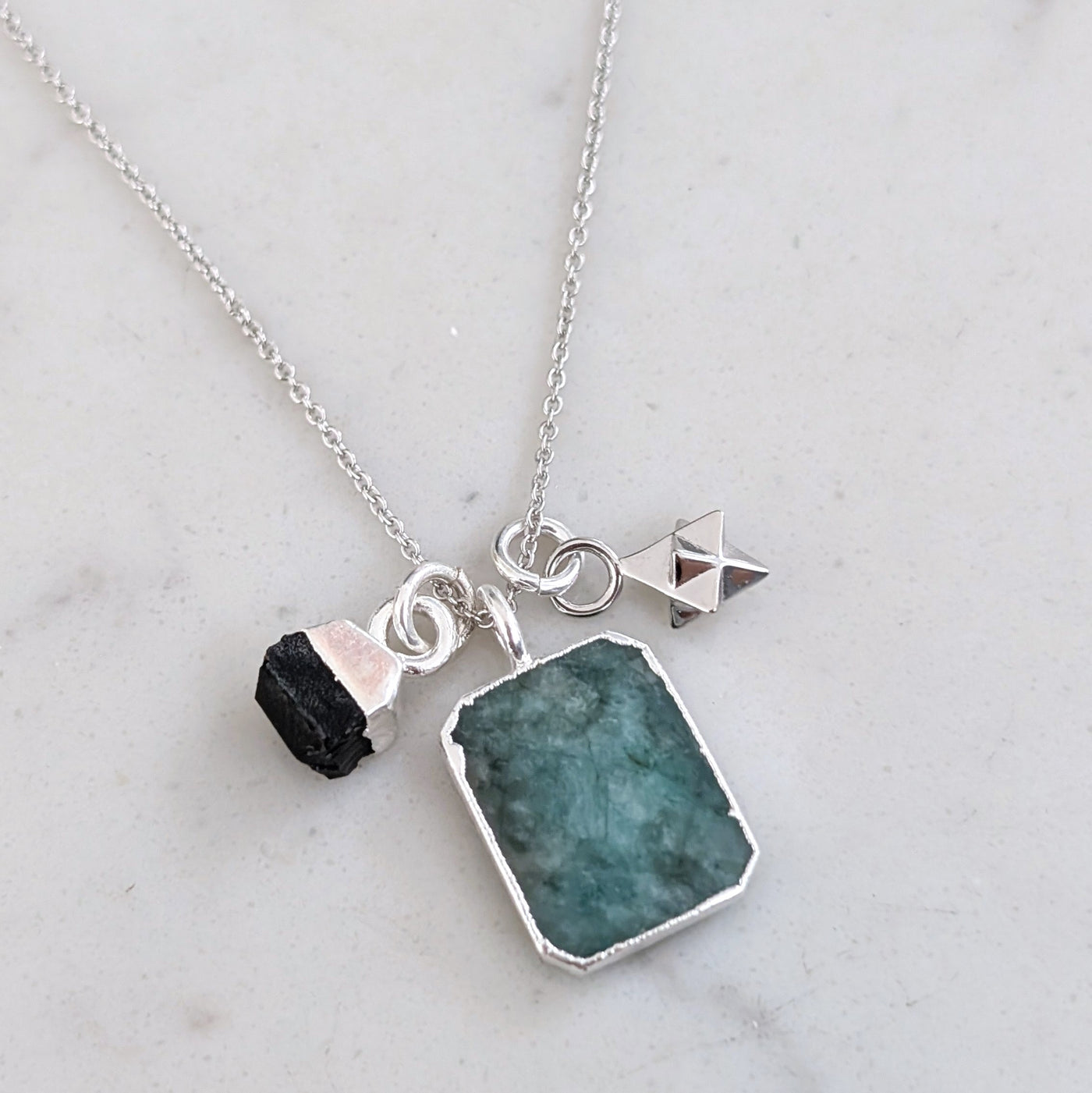 silver emerald and black onyx pendant necklace