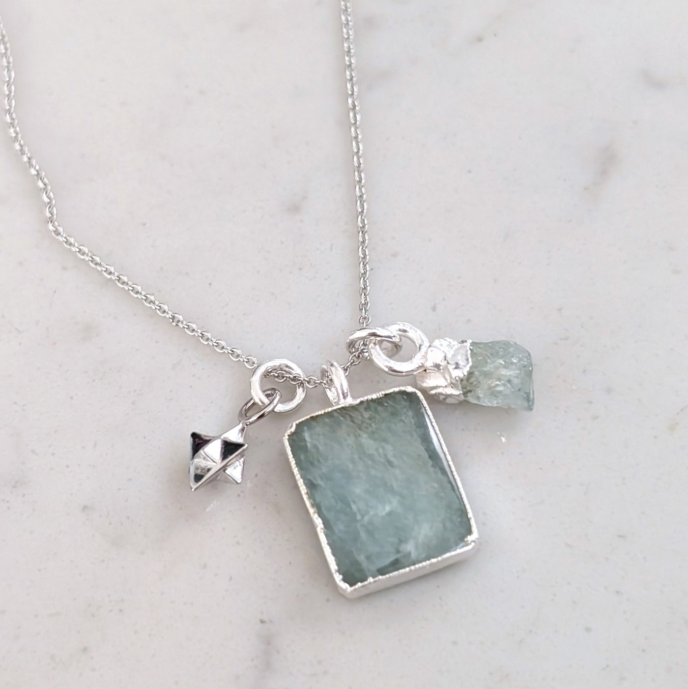 sterling silver aquamarine and charm pendant necklace