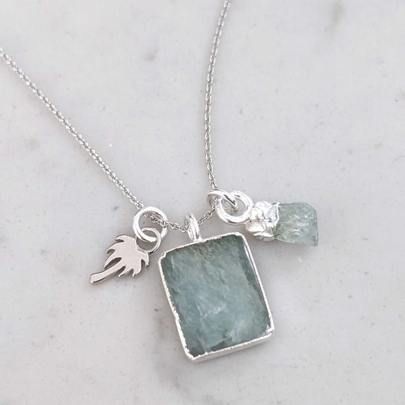 sterling silver aquamarine and charm pendant necklace