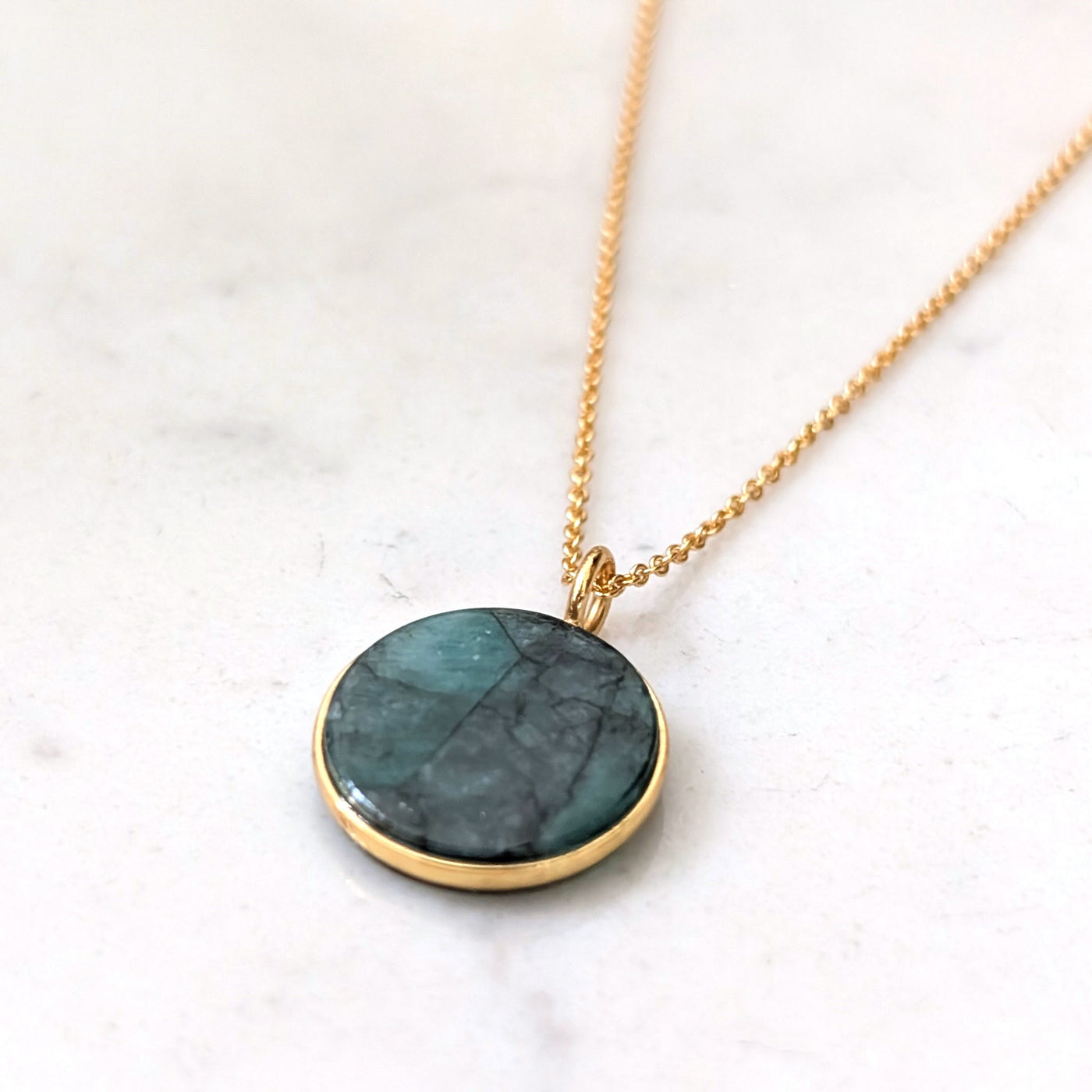 emerald circular pendant necklace